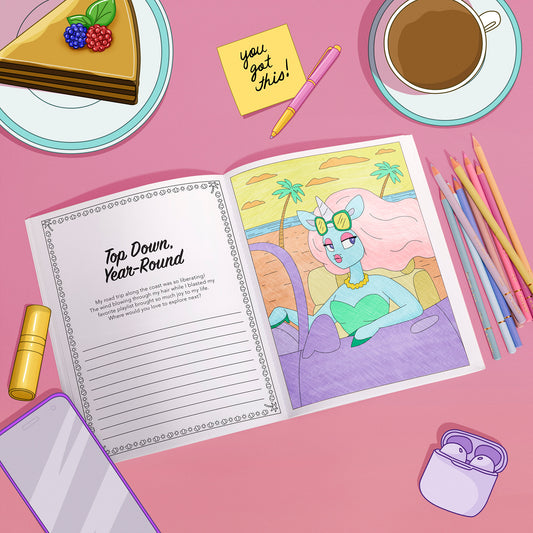 unicorn coloring book on a table with coffee and colored pencils