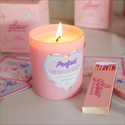perfect candle in pink jar with matches