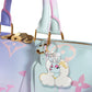 unicorn charm on pink and blue bag