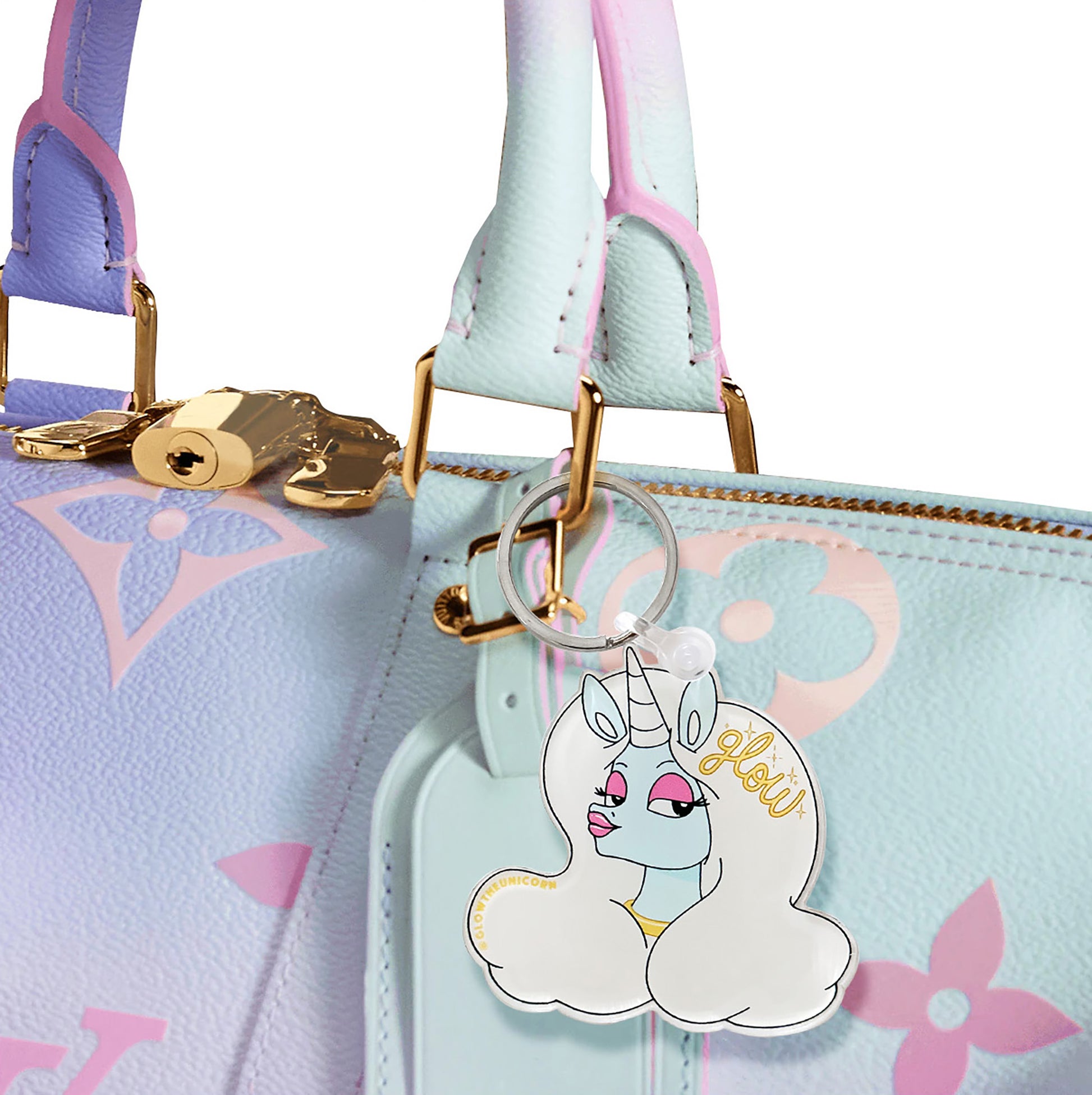 unicorn charm on pink and blue bag